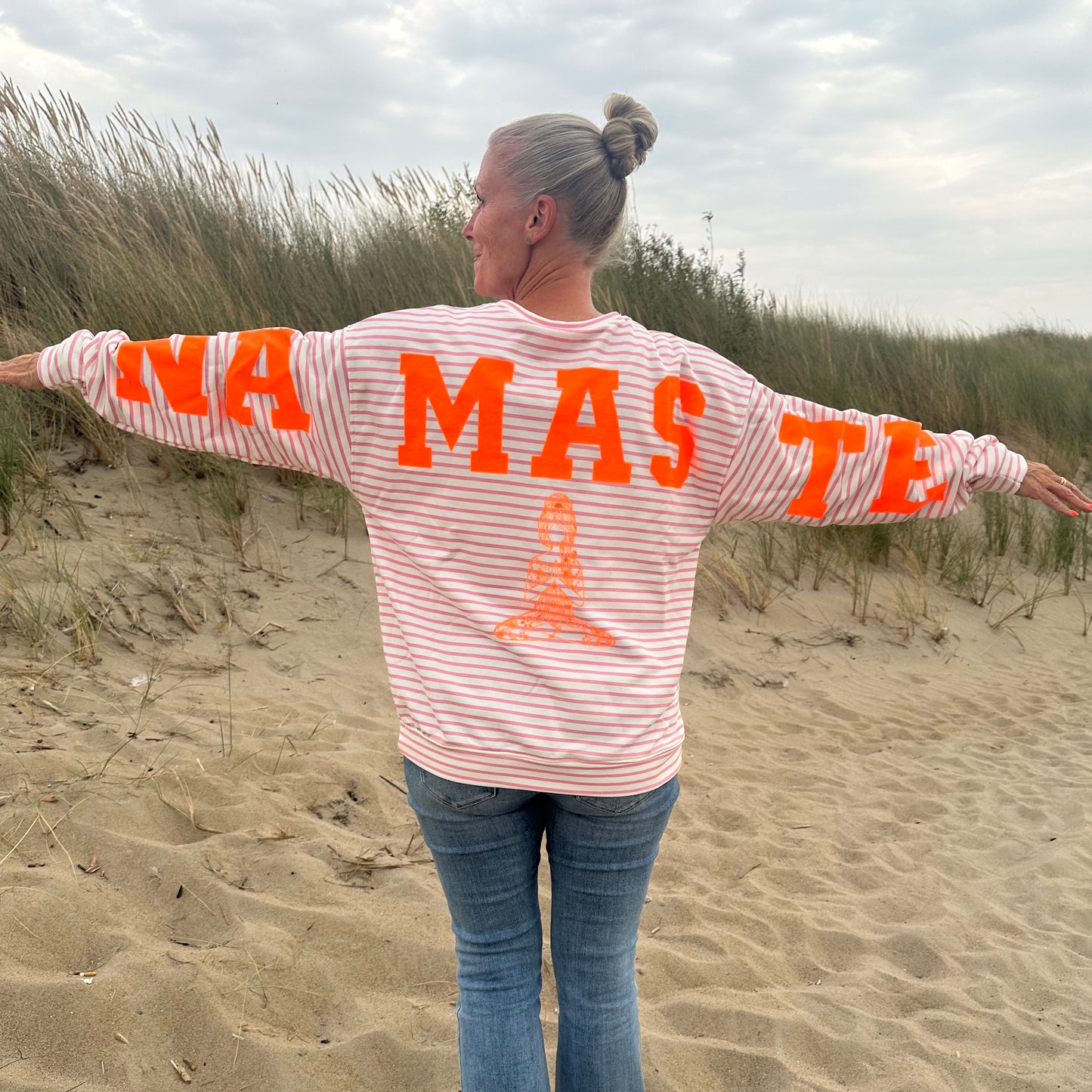 Sweater "Namaste" in rosa-orange