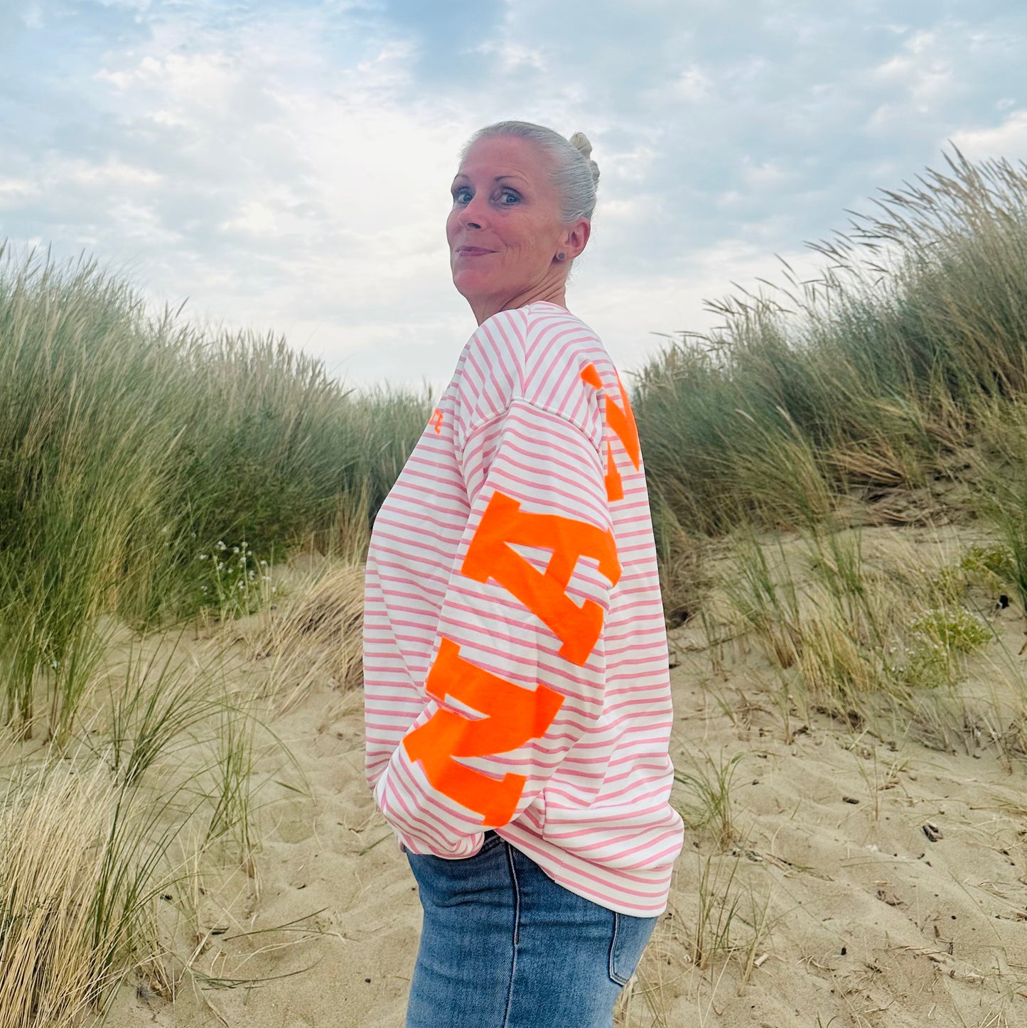 Sweater "Namaste" in rosa-orange