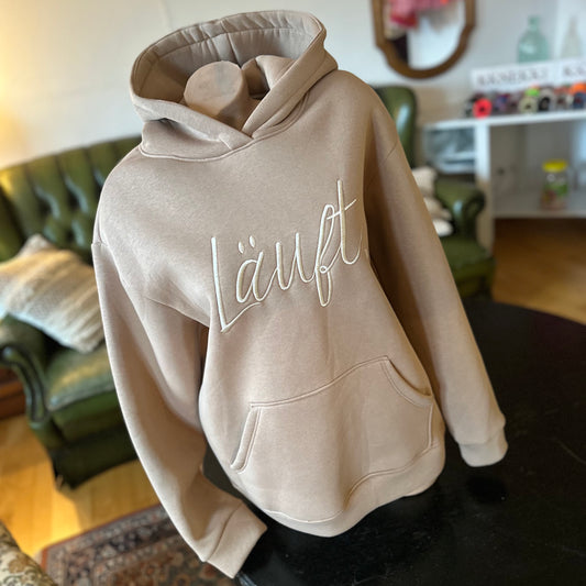 Kuschel-Hoodie "LÄUFT" in Beige (onesize)